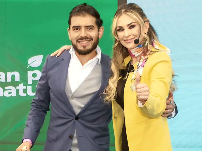 Ademir Alvarado with Aracely Arámbula on the BienFest stage